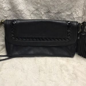 Carlos Santana brand handbag